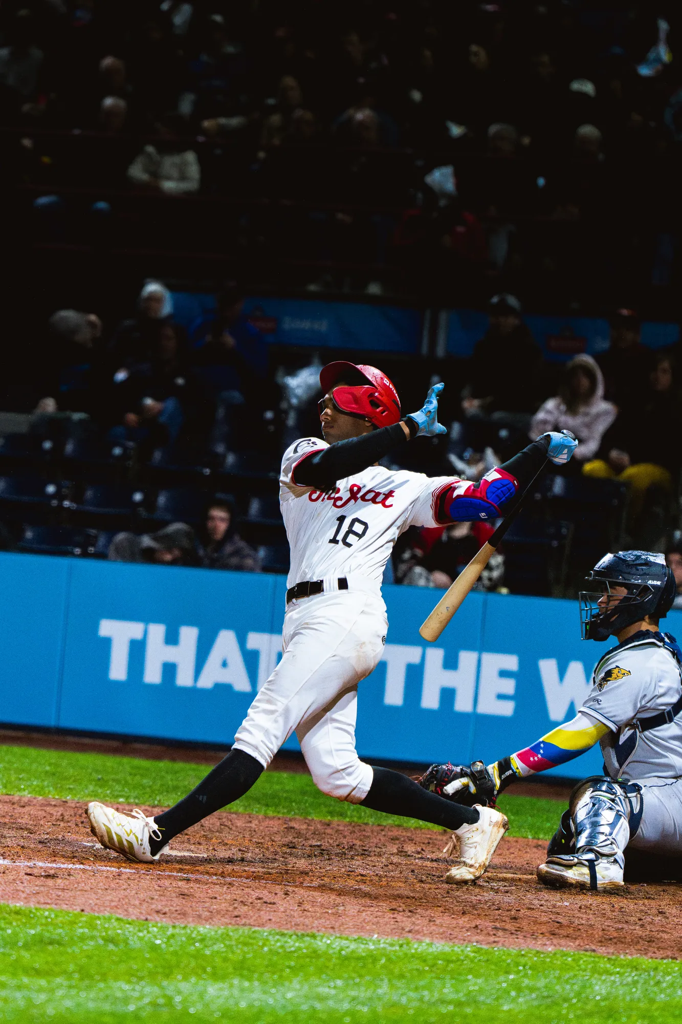 Vancouver Canadians vs Tri-City Dust Devils fielding action at Nat Bailey Stadium